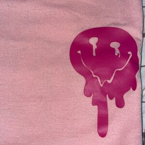 Amazon T-shirt, melting smiley face